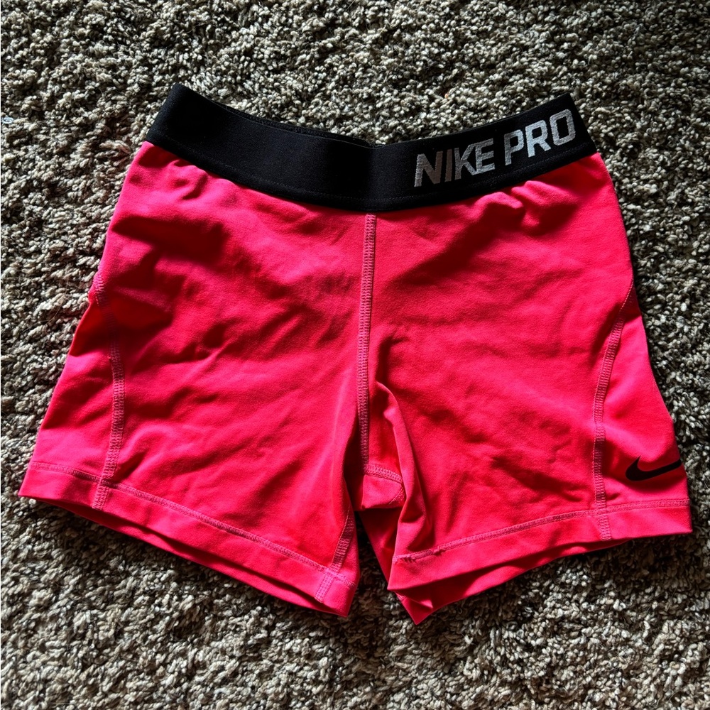 Hot pink Nike pros size kids Medium